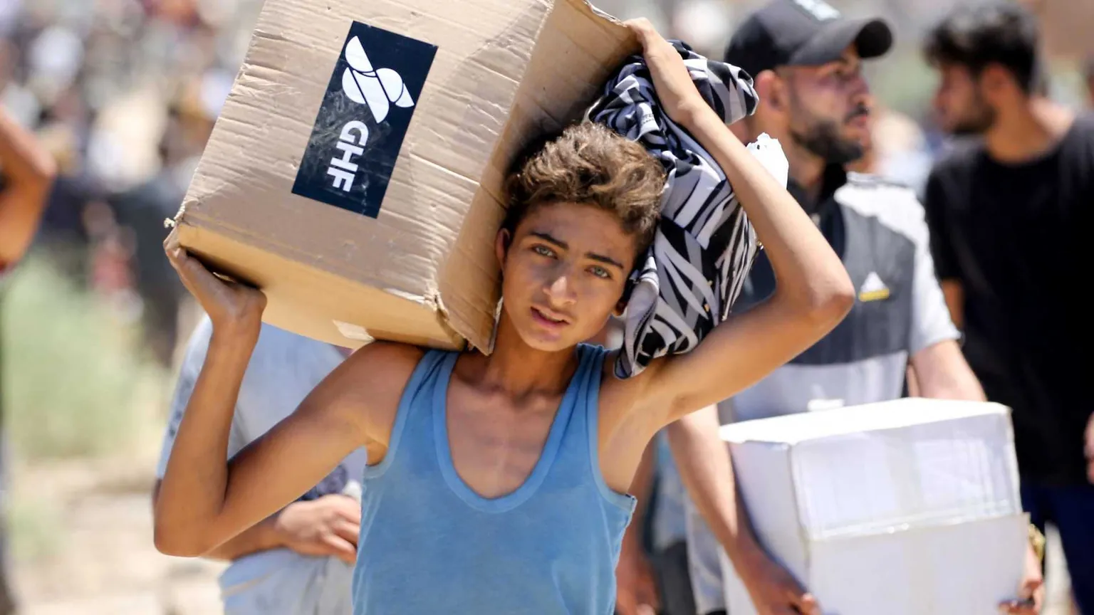 Spari, morti e versioni contrastanti: l'altra guerra è sugli aiuti umanitari