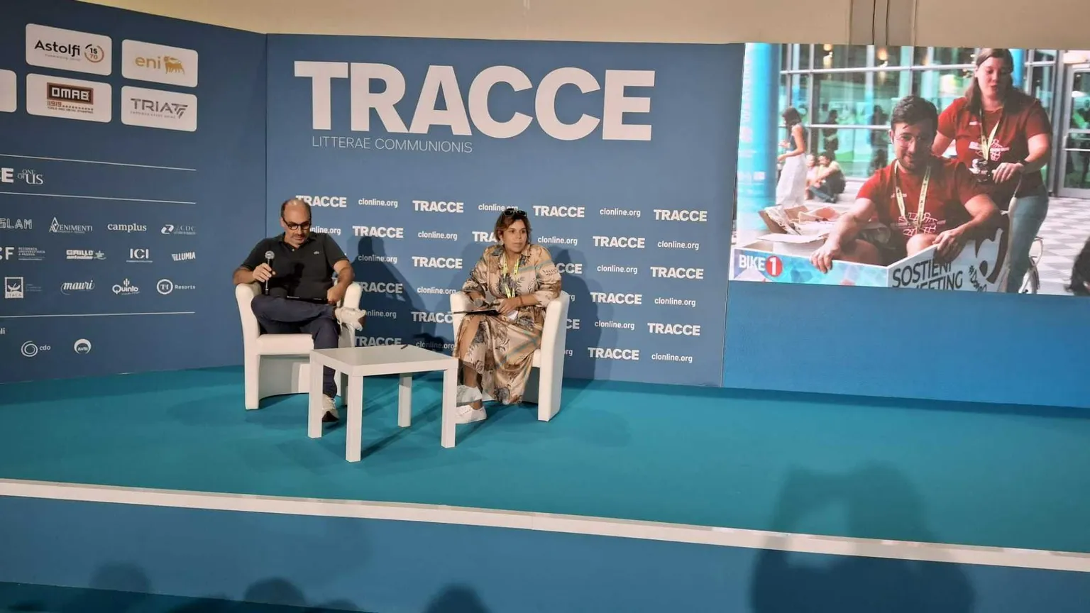 Enea e Giulia Simonato durante la loro testimonianza al Meeting di Rimini