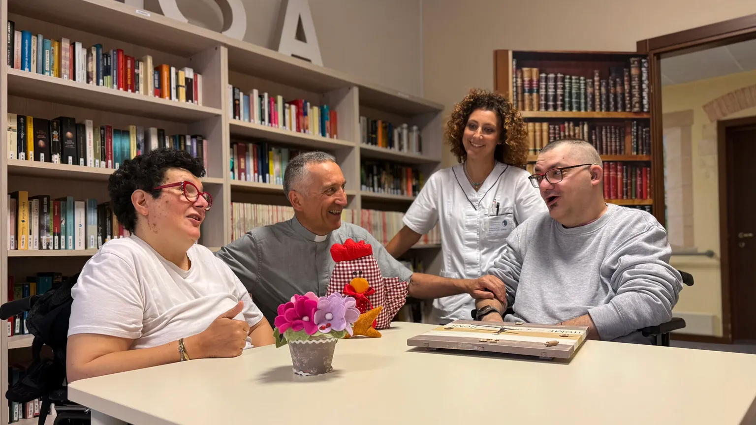 Don Andrea Gaino in una delle residenze gestite dalla Pia Opera Ciccarelli