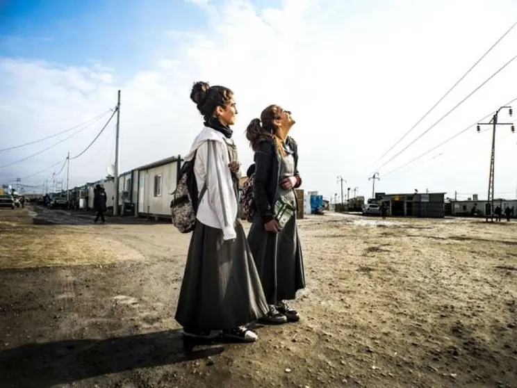 I pendolari della speranza in viaggio fino a Qaraqosh