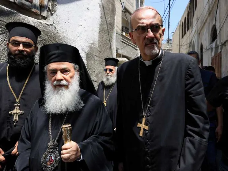 I due patriarchi nell'orrore della guerra: perché essere a Gaza è un dovere