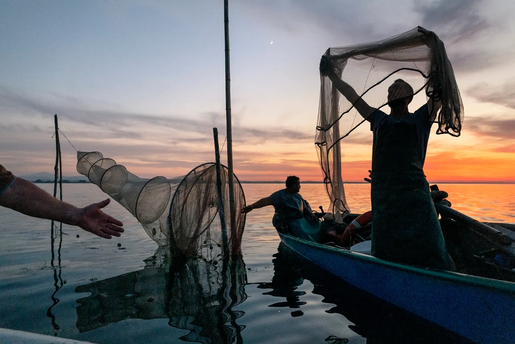 Pescatori sul Lago Trasimeno, Isola Polvese, Umbria, Italy, 2022 © Steve McCurry 