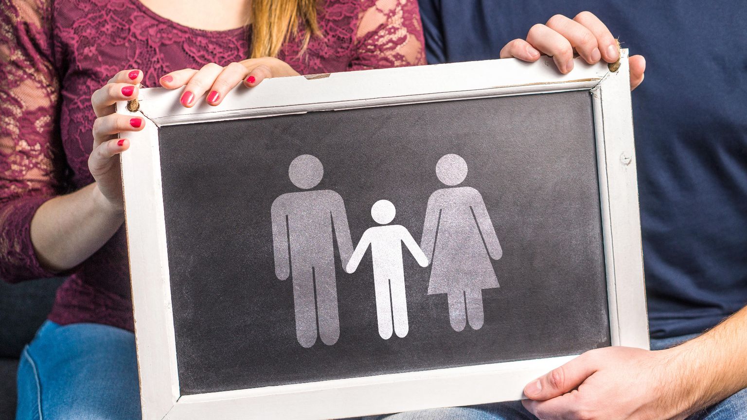 Una famiglia, su una lavagna