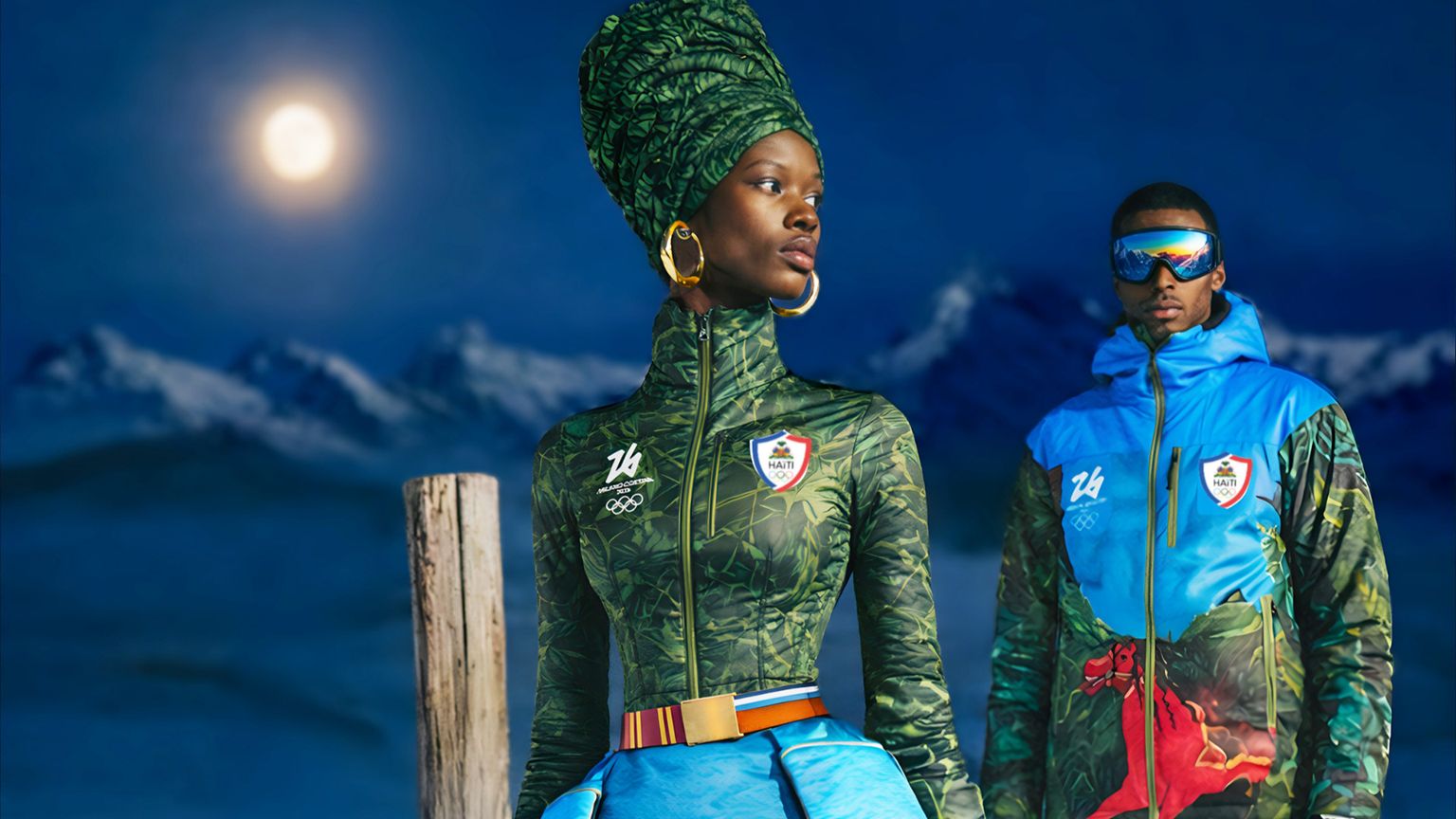 Un uomo e una donna sono vestiti con le divise olimpiche di Haiti, disegnate dalla stilista Stella Jean