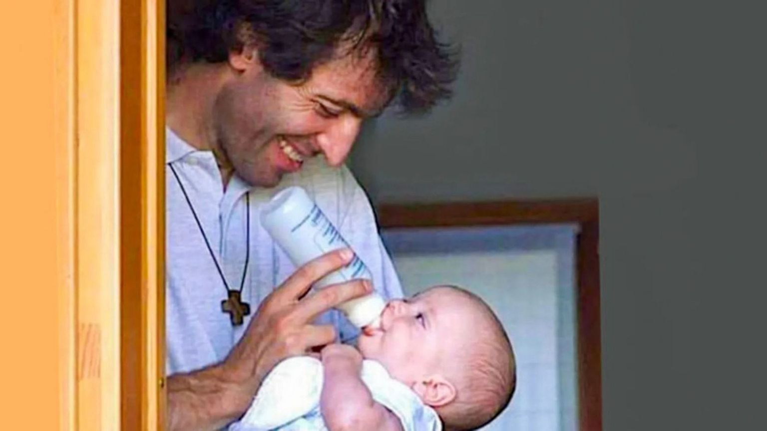 Don Roberto Malgesini con il suo nipotino