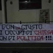 Striscione contro don Giusto, il vescovo: si recuperino toni pacati