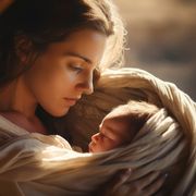 La foto mostra un ritratto di Maria con in braccio il Bambino Gesù