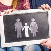 Una famiglia, su una lavagna