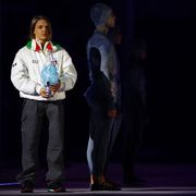 Lo spegnimento della fiamma olimpica tra le mani di Arianna Fontana