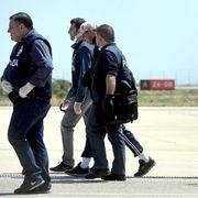 Alcuni migranti durante un'operazione di rimpatrio da Lampedusa /ANSA