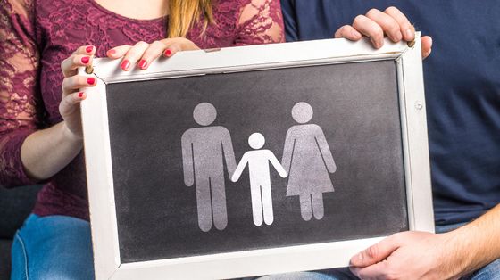 Una famiglia, su una lavagna