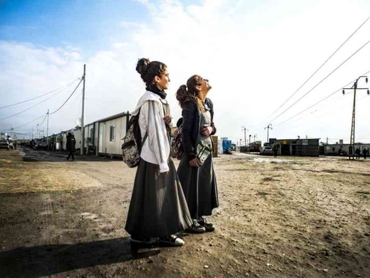 I pendolari della speranza in viaggio fino a Qaraqosh