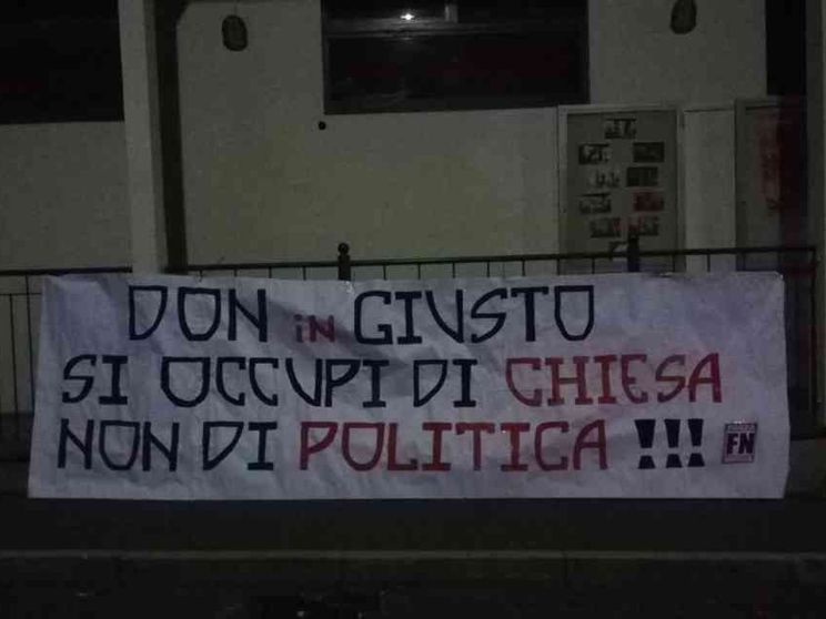 Striscione contro don Giusto, il vescovo: si recuperino toni pacati