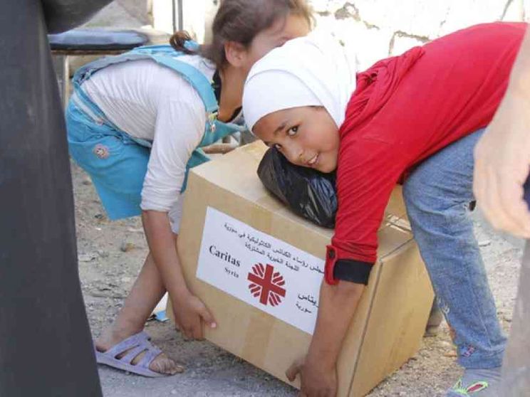 Siria, i «fiori» della Caritas tra le macerie