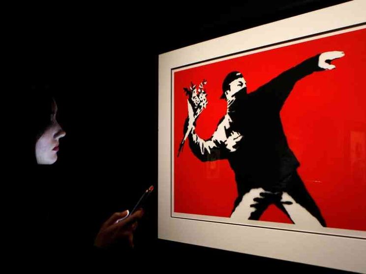 Banksy perde il copyright sul celebre "Flower Thrower"