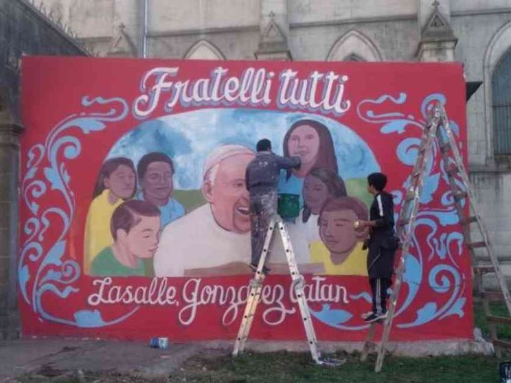 La Buenos Aires dei poveri: murales, rap e “Fratelli tutti”