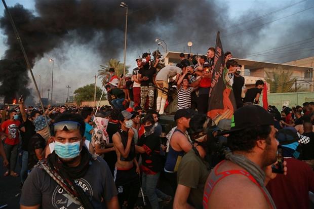 La polizia è accusata di aver sparato sulla folla nelloa capitale Baghdad (Ap0)