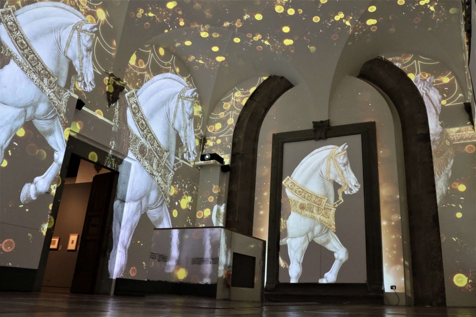 Una sala immersiva della mostra 'Benozzo Gozzoli e la Cappella dei Magi' a Palazzo Medici Riccardi di Firenze