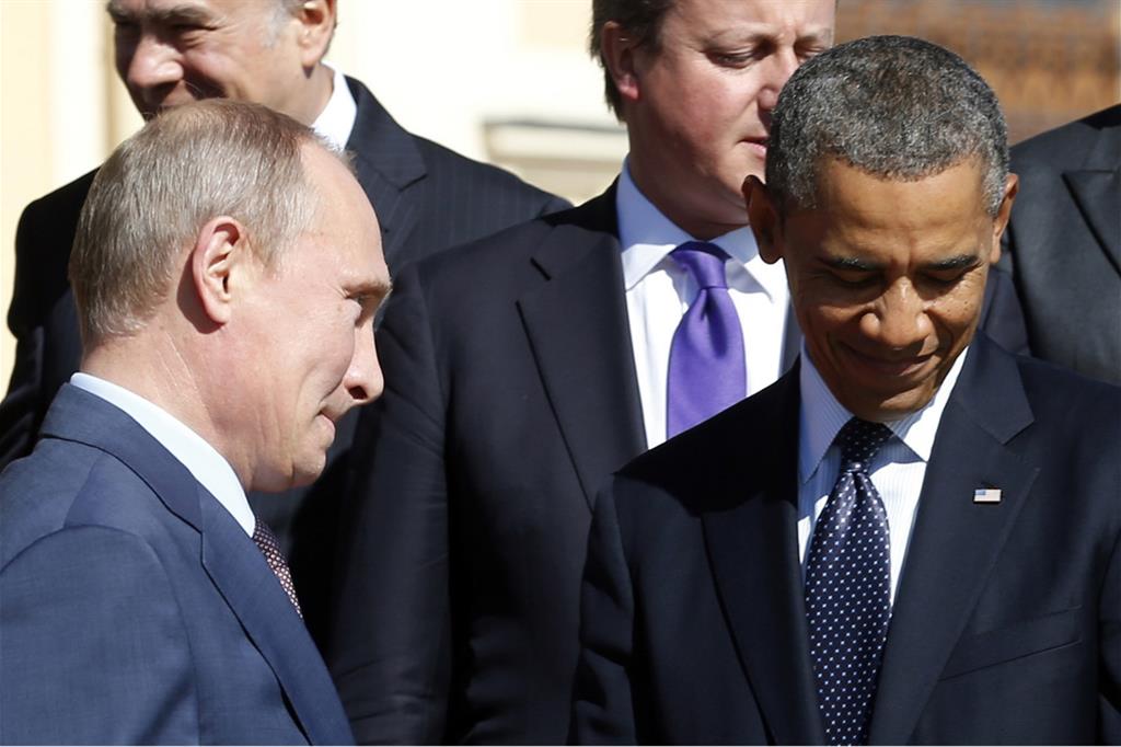 Obama con Putin in una foto dall'archivio reuters