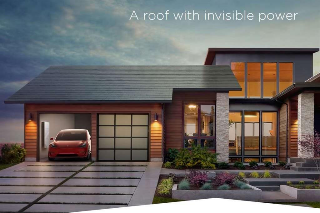 Il rendering di una casa attrezzata con i tetti solari (Foto Tesla-SolarCity)