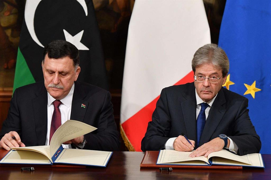 La firma dell'accordo Italia-Libia (Ansa)
