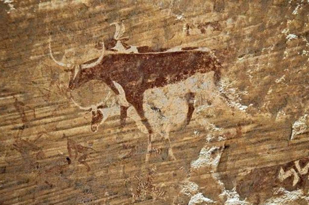 Pitture rupestri del neolitico a Takarkori, nel sito del Tadrart Acacus (Savino di Lernia - Dipartimento di Scienze dell'antichità - Università La Sapienza, Roma)