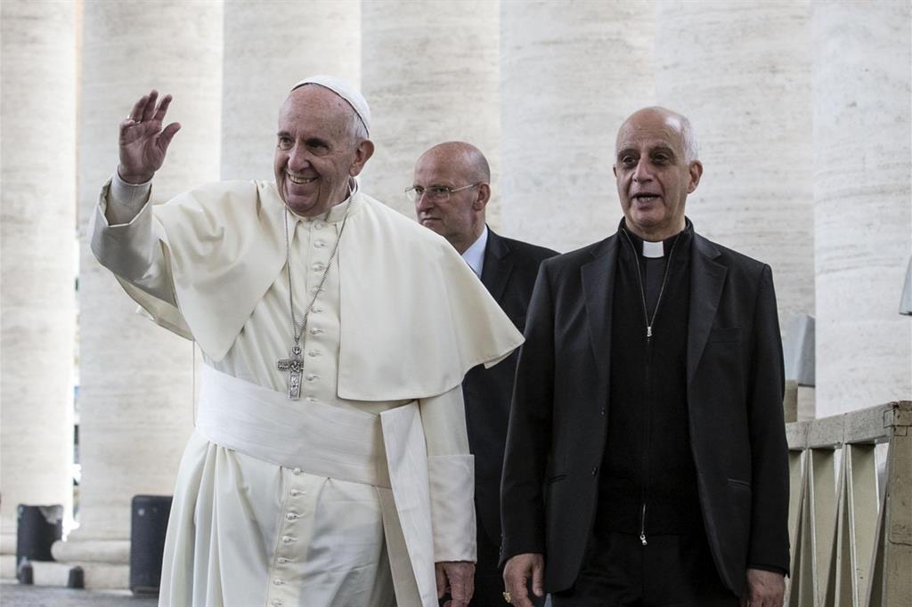 Il Papa con monsignor Fisichella in una foto dell'archivio Ansa del 2016