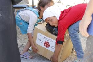 Siria, i «fiori» della Caritas tra le macerie