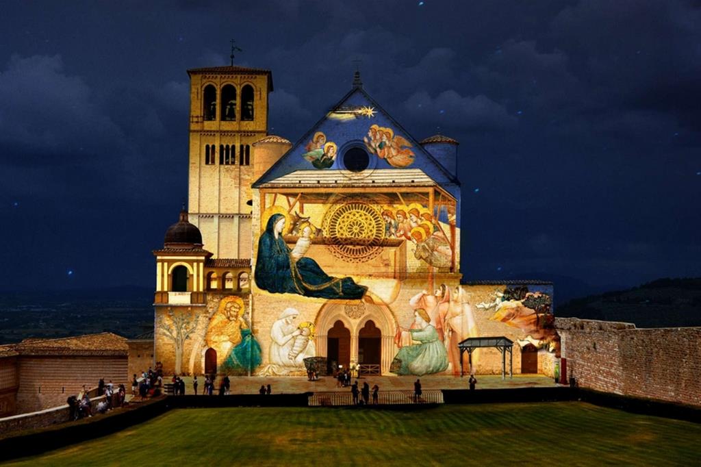 I dipinti di Giotto proiettati sulla facciata della Basilica di San Francesco ad Assisi
