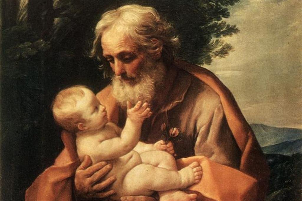 San Giuseppe tiene in braccio Gesù bambino