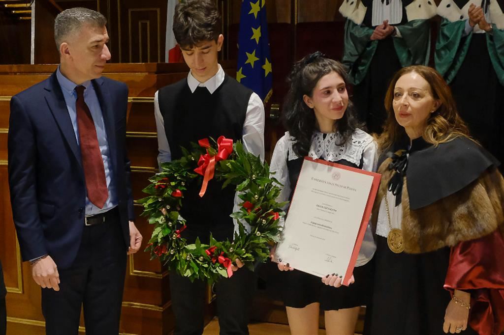 Alla laurea di Giulia, nell'Aula Magna dell'Università di Padova, la sua famiglia (papà Gino, la sorella e il fratello) e la rettrice Daniela Mapelli