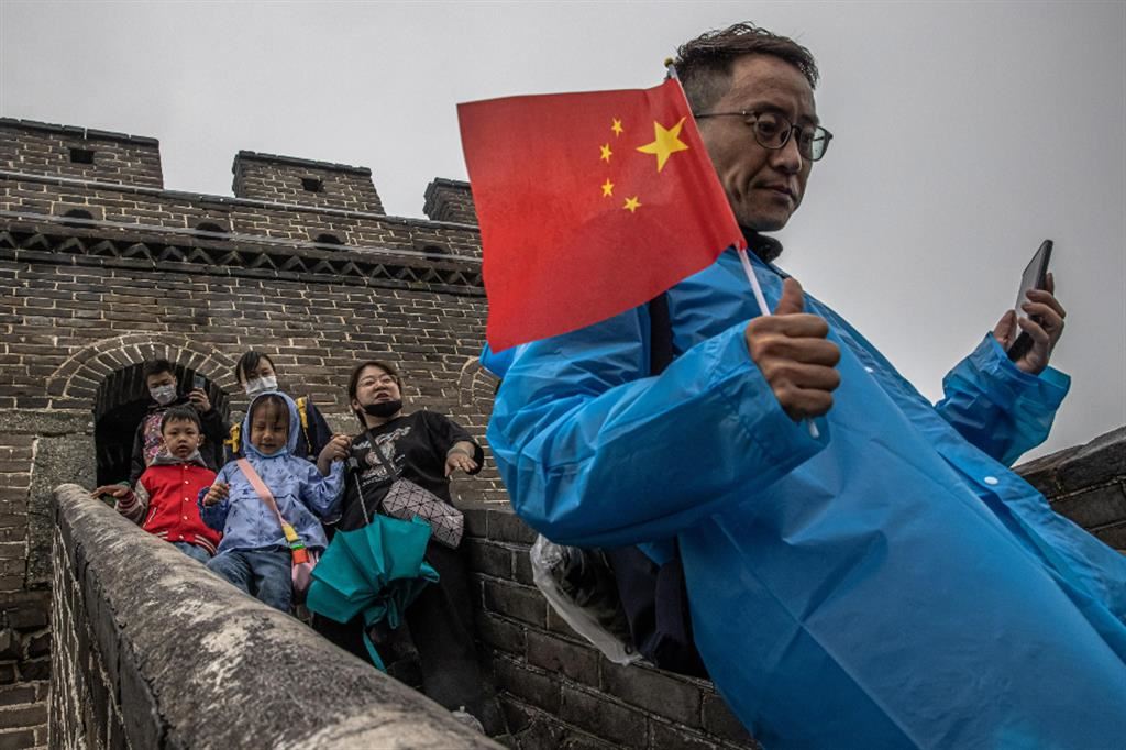Turisti cinesi in visita alla Grande Muraglia